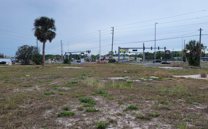 Pictures of Land property located at 8835 Denton Ave, Hudson, FL 34667 for sales - image #1