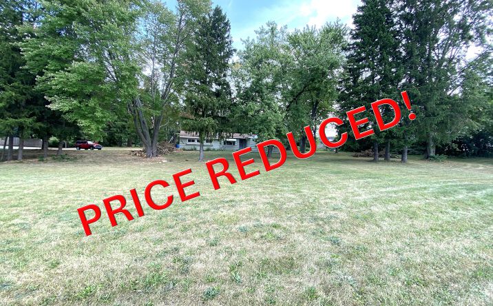 Pictures of Land property located at 2450 S Commerce Rd, Walled Lake, MI 48390 for sales - image #1