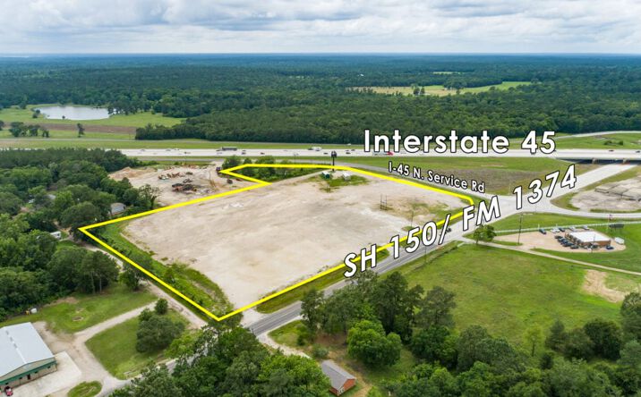 Pictures of Land property located at I-45 N Service Rd,, New Waverly, TX 77358 for sales - image #1