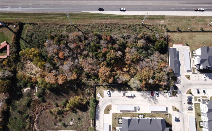 Pictures of Land property located at 848 N Harvey Mitchell Pkwy, Bryan, TX 77807 for sales - image #1