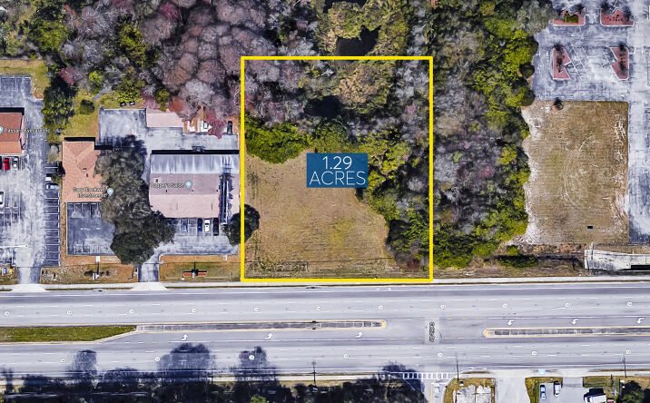 Pictures of Land property located at 7101 FL-54, New Port Richey, FL 34653 for sales - image #1