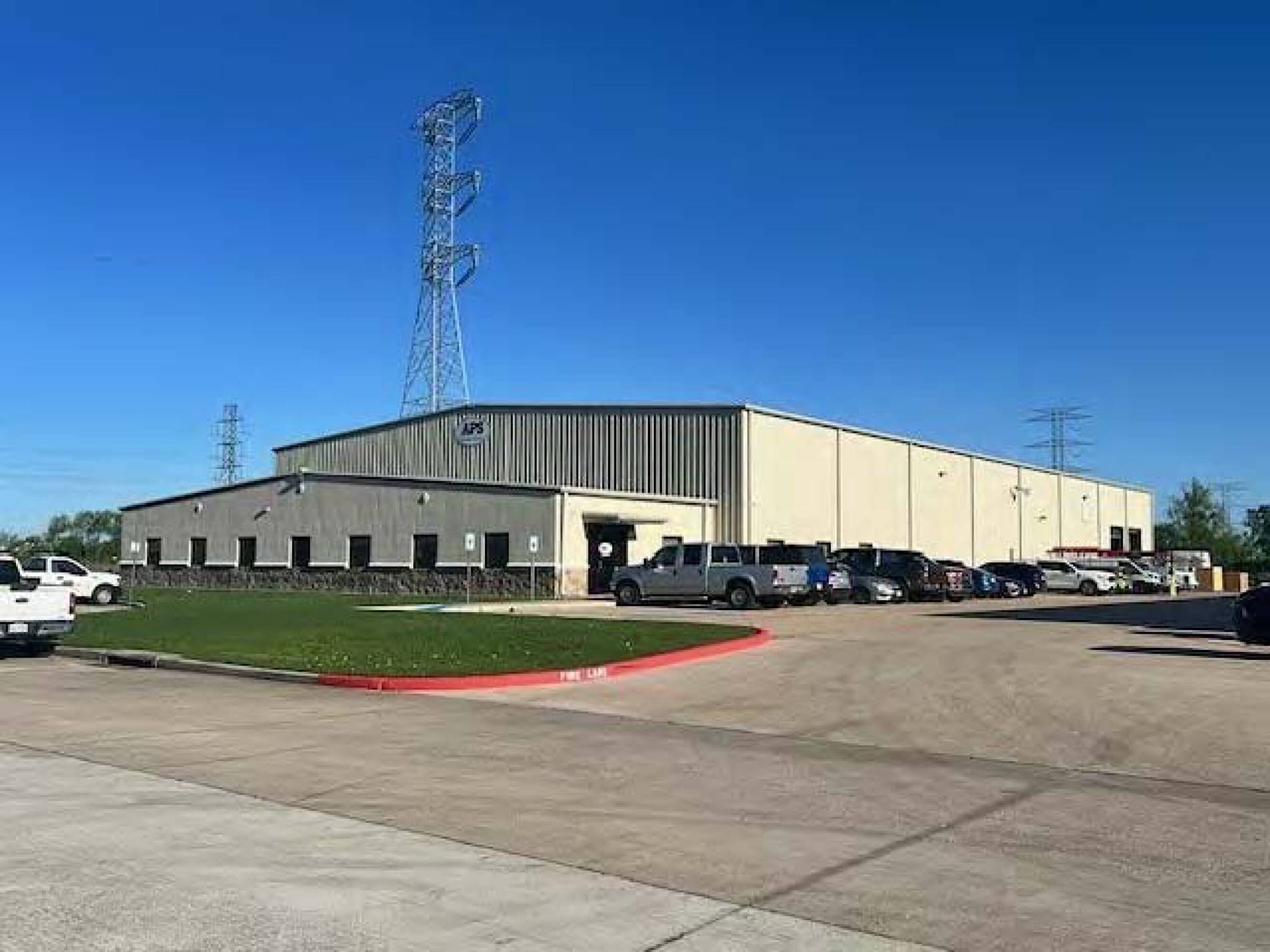 Four Seasons Business Park industrial building with loading dock and ample parking.