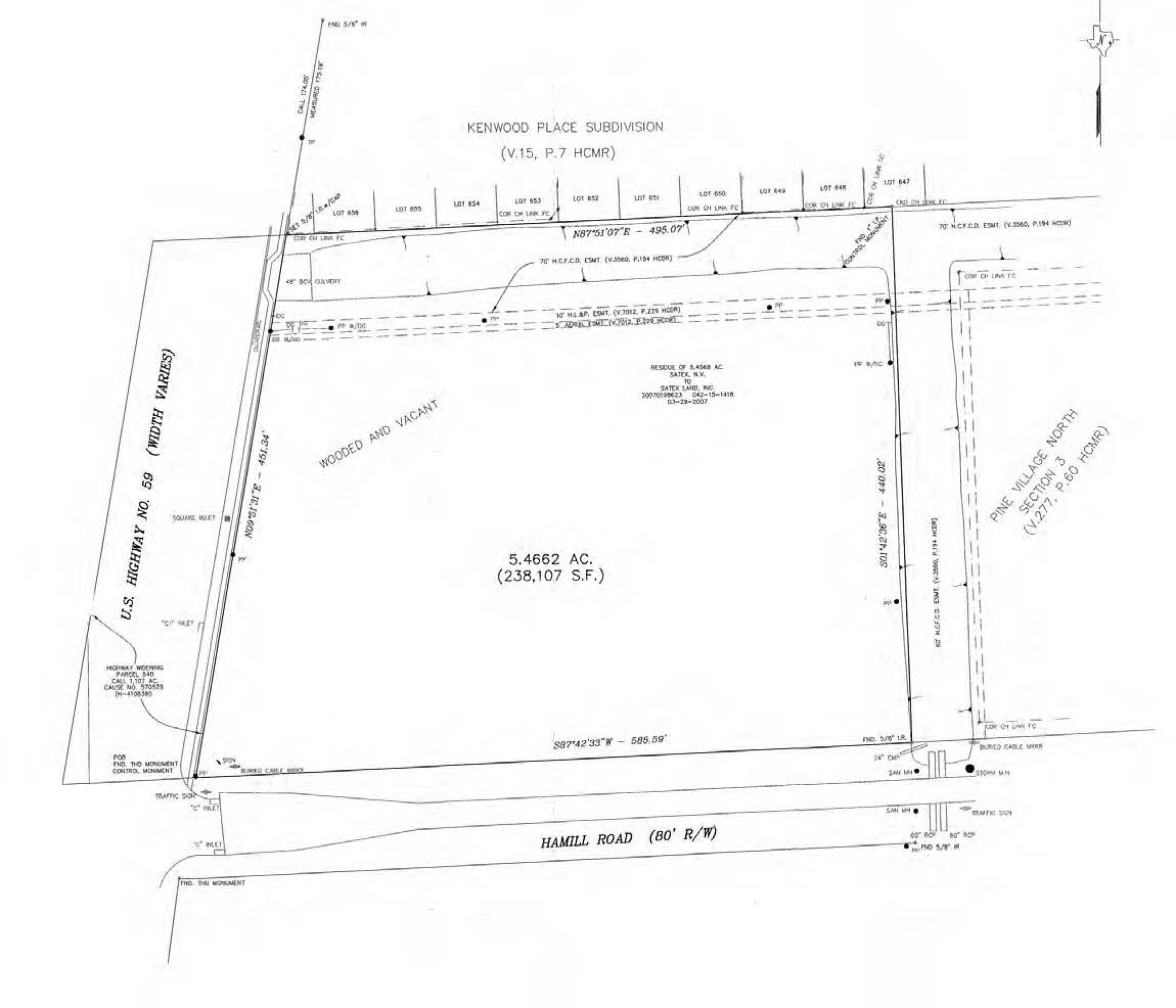 Aerial view of a rectangular vacant land parcel with clear boundary lines and access points along Eastex Fwy and Randalls Rd.