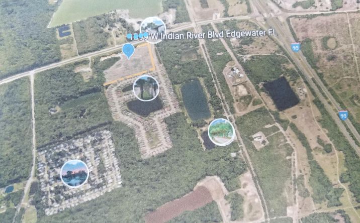 Pictures of Land property located at 3199 W Indian River Boulevard, Edgewater, FL 32132 for sales - image #1