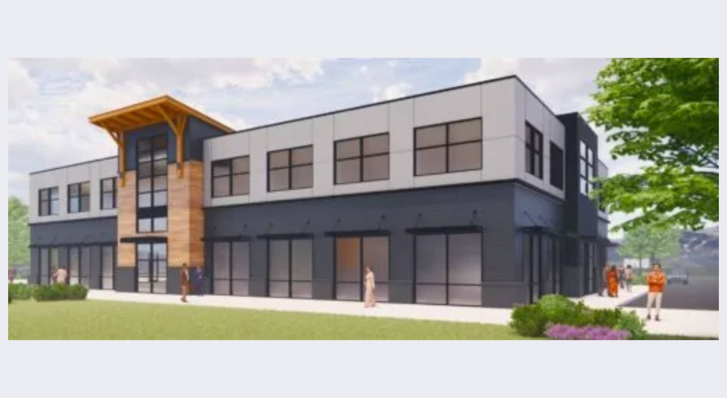 Modern mixed-use development building with large windows and surface parking at 9410 Anderson Mill Rd, Austin, TX.