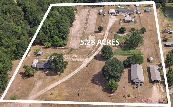 Pictures of Land property located at 18745 TX-105, Cleveland, TX 77328 for sales - image #1