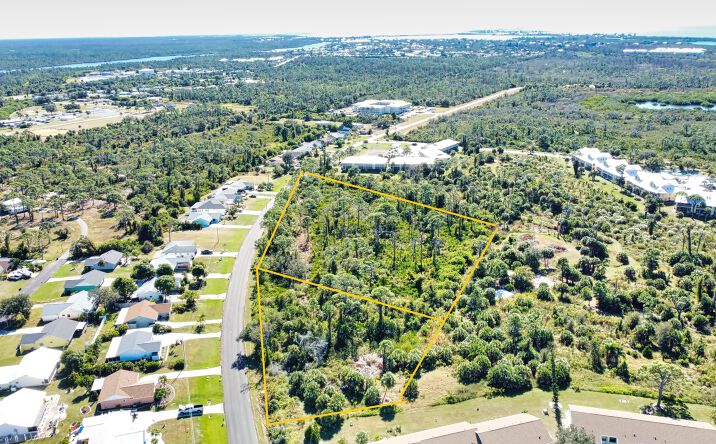 Pictures of Land property located at 6700 Gasparilla Pines Blvd, Englewood, FL 34224 for sales - image #1