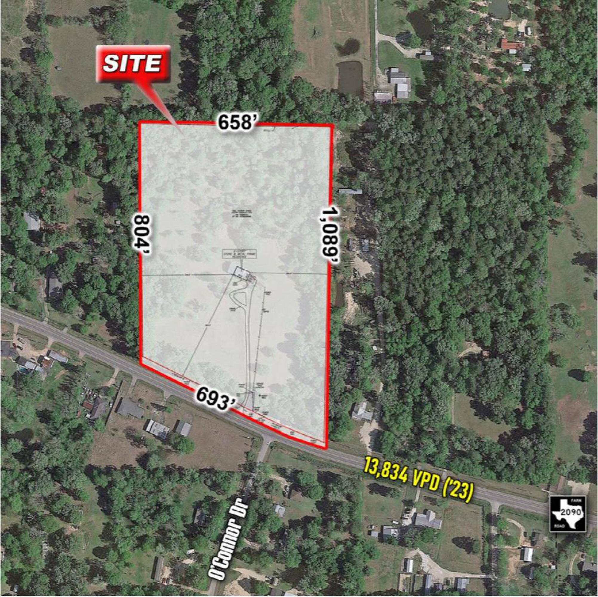 Aerial view of 14.06 acres of land on FM 2090 in Splendora, TX, with dimensions and traffic count highlighted.