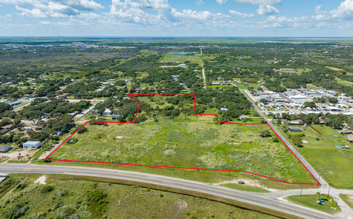 Pictures of Land property located at 1120 N Commercial St, Aransas Pass, TX 78336 for sales - image #1