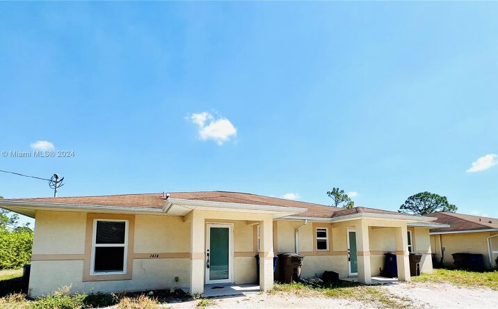 Pictures of Multifamily property located at 1412-1414 W 12th St, Lehigh Acres, FL 33972 for sales - image #1