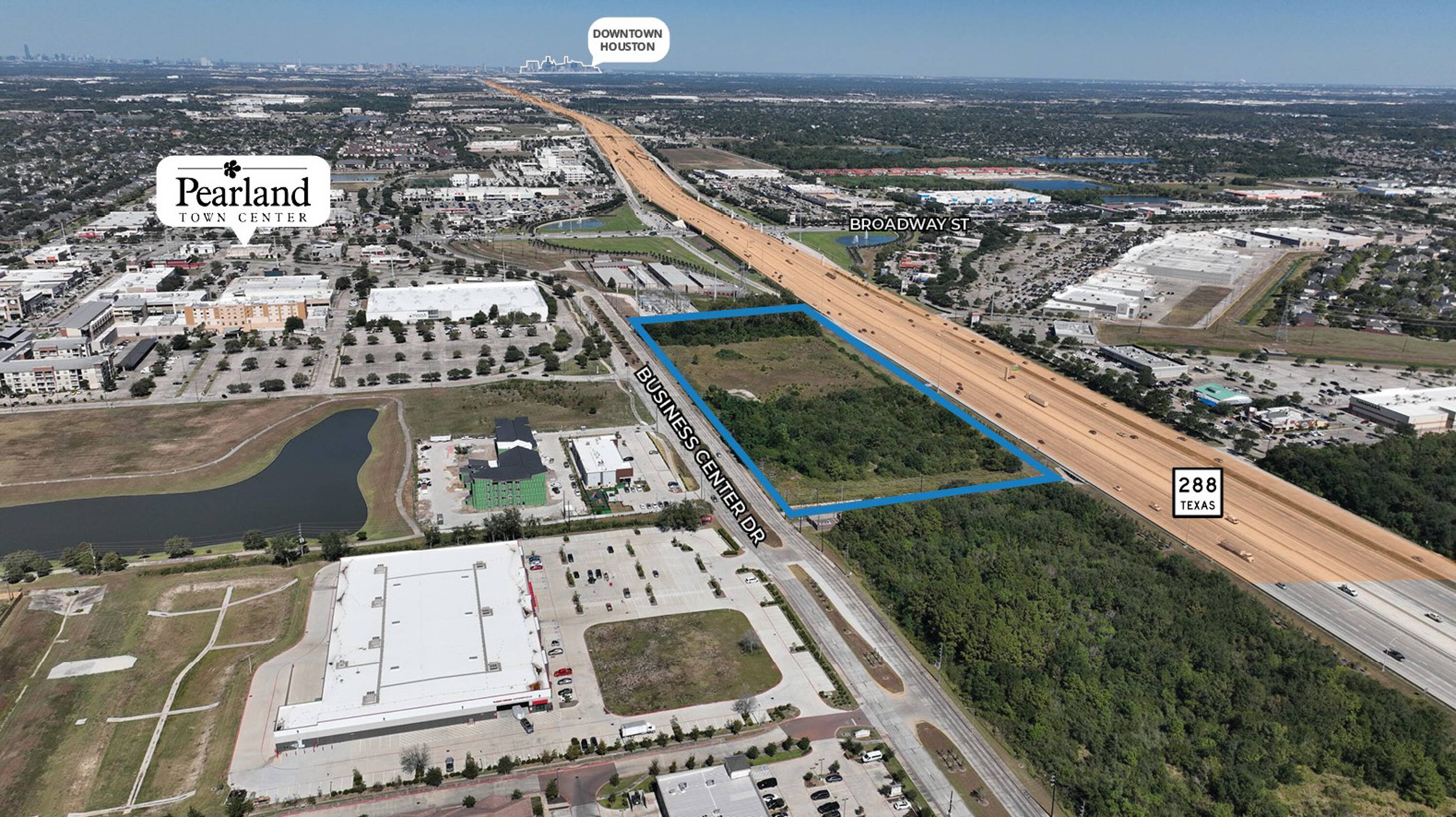 Aerial view of undeveloped land at SH 288 & FM 518, Business Center Dr., Pearland, TX, with surrounding commercial and industrial properties.