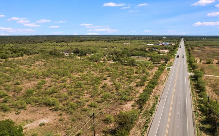 Pictures of Land, Mixed Use, Mobile Home Park property located at 1428 TX-21, Cedar Creek, TX 78612 for sales - image #1