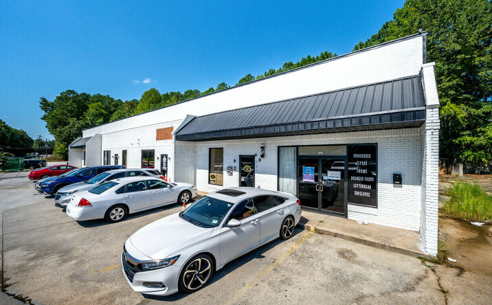 Pictures of Retail property located at 565-595 Garden Walk Boulevard, Atlanta, GA 30349 for sales - image #1