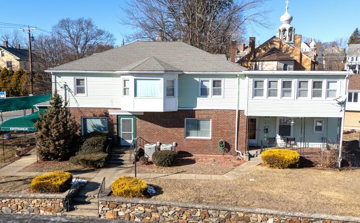 Pictures of Mixed Use, Multifamily, Office, Special Purpose property located at 75 Harris Ave, Woonsocket, RI 02895 for sales - image #1