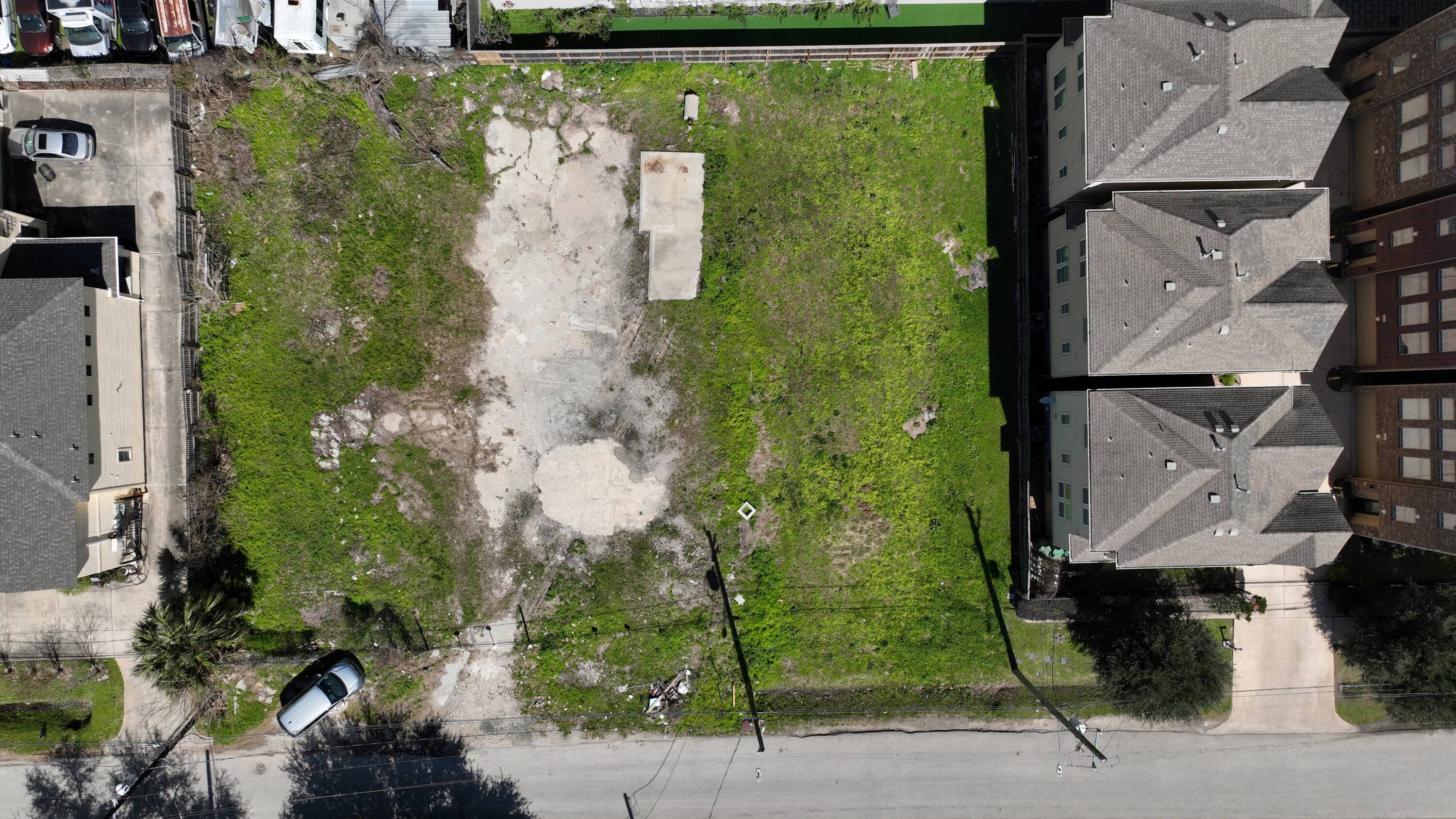Aerial view of a vacant land parcel at 7121 Fannin St & 1105 Saint Agnes St, Houston, TX, ready for development.