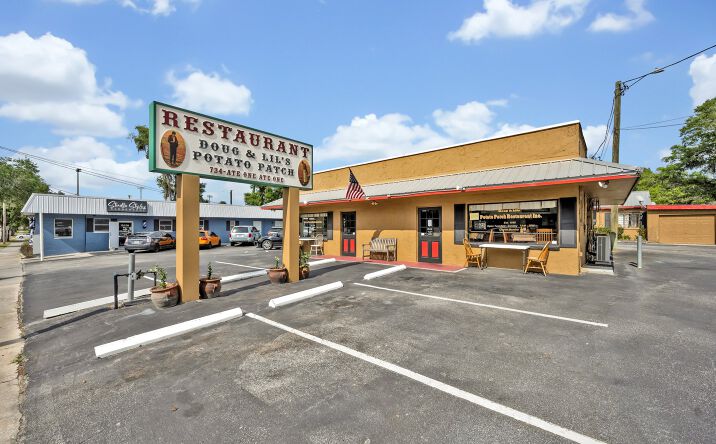 Pictures of Hospitality, Mixed Use, Retail property located at 635 S Woodland Blvd, Deland, FL 32720 for sales - image #1