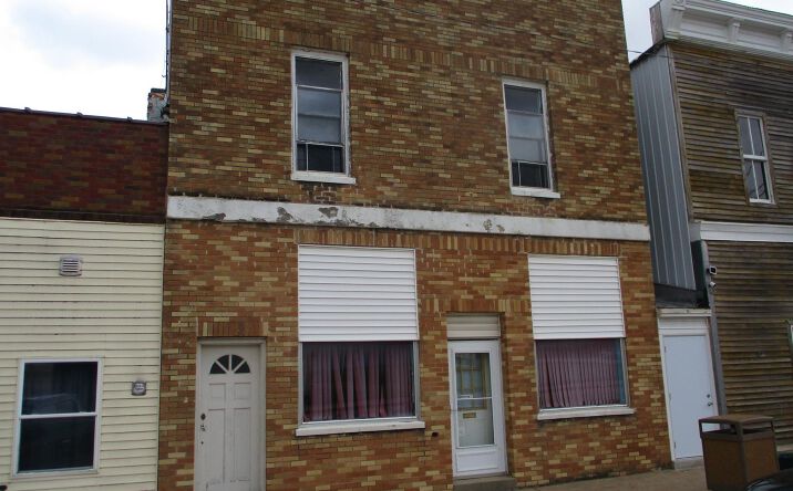 Pictures of Multifamily property located at 317 Main Street, Clutier, IA 52217 for sales - image #1