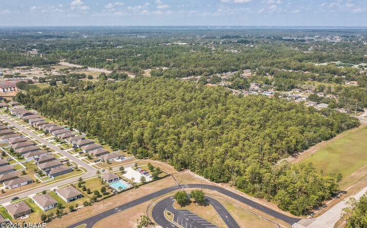Pictures of Land property located at 0 Tennessee (Paper) Avenue, Deltona, FL 32738 for sales - image #1