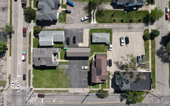 Pictures of Multifamily property located at 235 W Washington Ave, Jackson, MI 49201, 240 W Wesley St, Jackson, MI 49201, 305 S Blackstone St, Jackson, MI 49201, 309 S Blackstone St, Jackson, MI 49201, 311.5 S blackstone st, Jackson, MI 49201 for sales - image #1