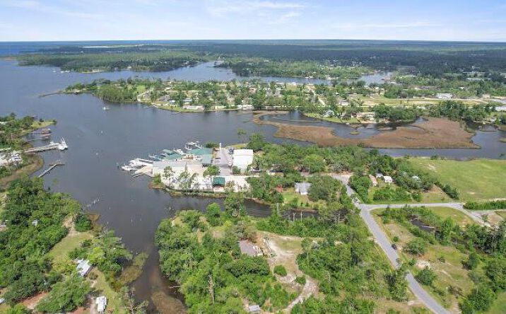Pictures of Land property located at 2026 Fulton Street, Southport, FL 32409 for sales - image #1