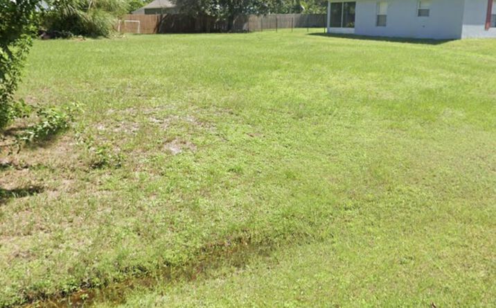 Pictures of Land property located at 411 Bargello Avenue SE, Palm Bay, FL 32909 for sales - image #1