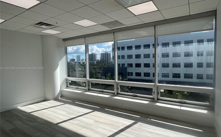 Pictures of Office, Multifamily property located at 20900 NE 30th Ave # 412 #410-411-412, Aventura, FL 33180 for sales - image #1