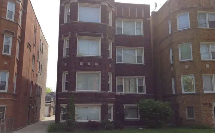 Pictures of Multifamily property located at 7965 S Phillips Avenue, Chicago, IL 60617 for sales - image #1