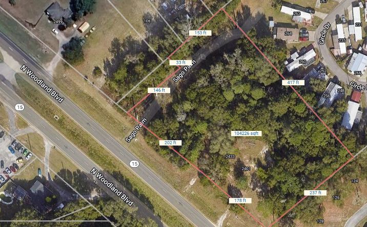 Pictures of Land property located at 2401 N WOODLAND BLVD, Deland, FL 32720 for sales - image #1