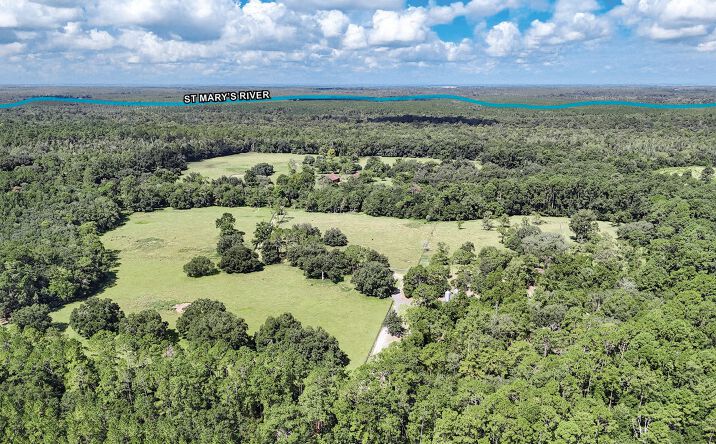 Pictures of Land property located at Rowe Ave, Bryceville, FL 32009 for sales - image #1