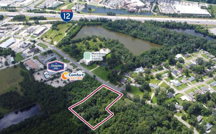 Pictures of Retail, Land property located at 303 Rushing Rd, Denham Springs, LA 70726 for sales - image #1