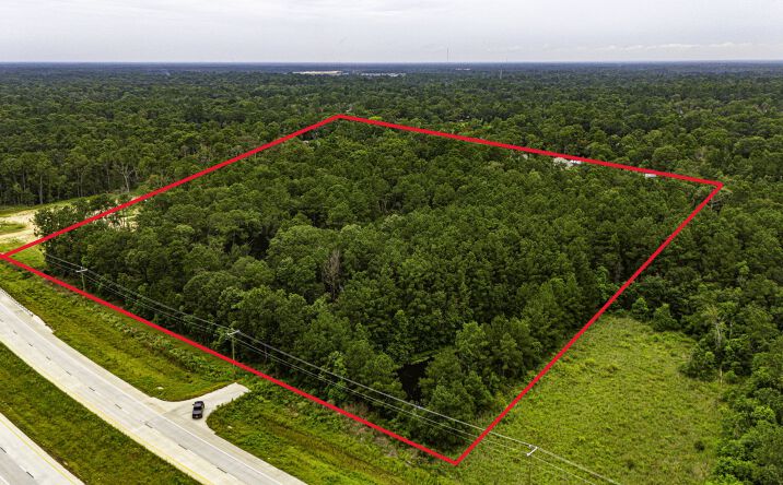 Pictures of Land property located at TBD Hwy 242, Conroe, TX 77302 for sales - image #1