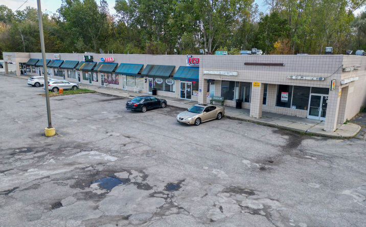 Pictures of Retail property located at 325-345 W Walton Blvd, Pontiac, MI 48340 for sales - image #1