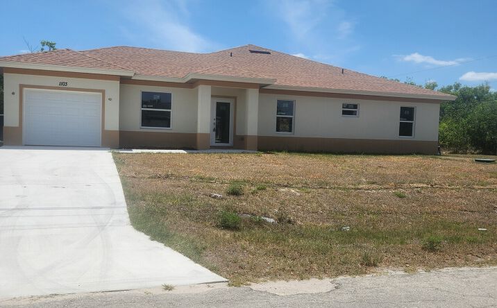 Pictures of Multifamily property located at 1101-1103 Harold Ave S, Lehigh Acres, FL 33973 for sales - image #1