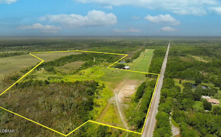 Pictures of Land property located at 520 Highlander, Oak Hill, FL 32759 for sales - image #1