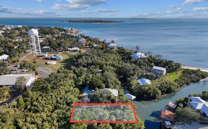Pictures of Land property located at Lot 7 9th St, Cedar Key, FL 32625 for sales - image #1