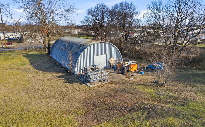 Pictures of Industrial, Mixed Use, Office property located at 107 W Apple Blossom Ave, Lowell, AR 72745 for sales - image #1