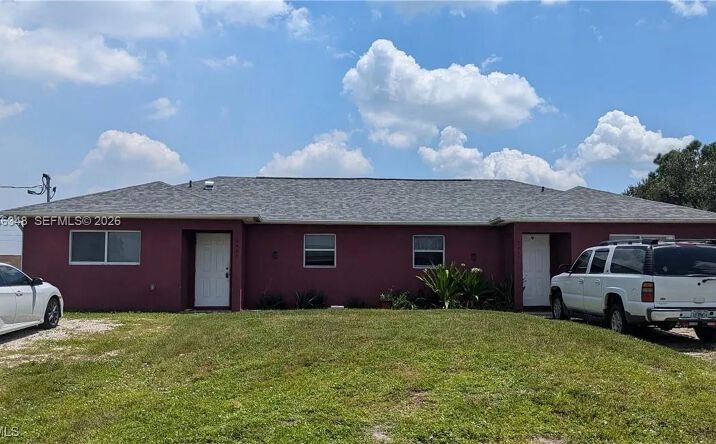 Pictures of Multifamily property located at 2405/07 Mansfield Ave. S., Lehigh Acres, FL 33973 for sales - image #1