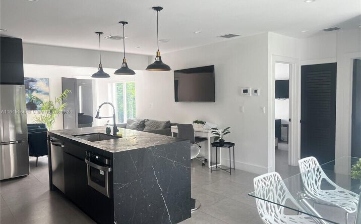 Pictures of Mixed Use, Multifamily property located at 15 NW 52nd St, Miami, FL 33127 for sales - image #1