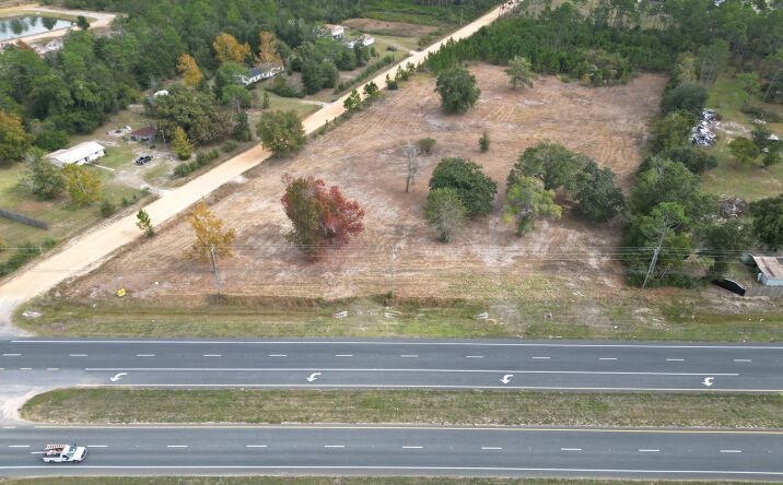 Pictures of Land property located at 11902 Highway 77 Highway, Southport, FL 32409 for sales - image #1