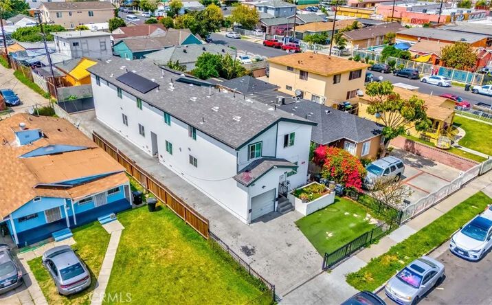 Pictures of Multifamily property located at 8711 Mckinley Place, Los Angeles, CA 90002 for sales - image #1