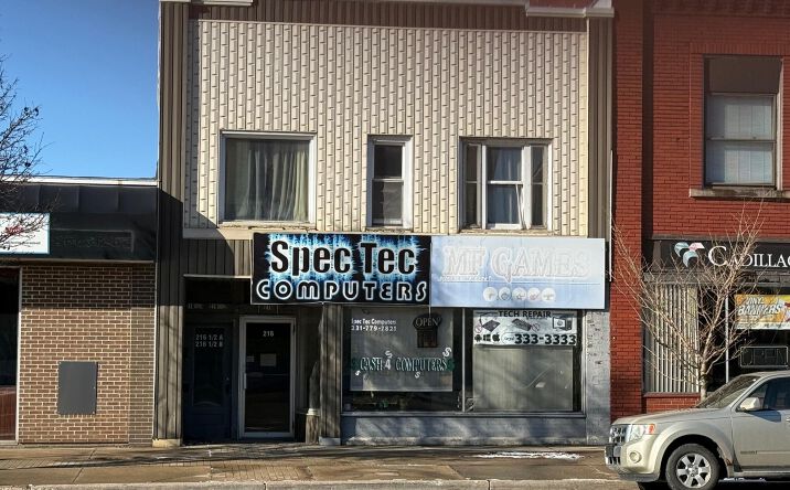 Pictures of Retail, Office, Land, Mixed Use property located at 216 S Mitchell Street, Cadillac, MI 49601 for sales - image #1