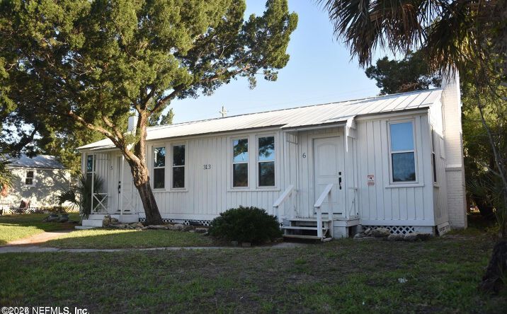 Pictures of Multifamily, Mixed Use property located at 313 ANASTASIA Boulevard A & B, St. Augustine, FL 32080 for sales - image #1