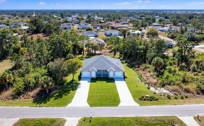 Pictures of Multifamily property located at 2421/2423 milton ave s, Lehigh Acres, FL 33973 for sales - image #1