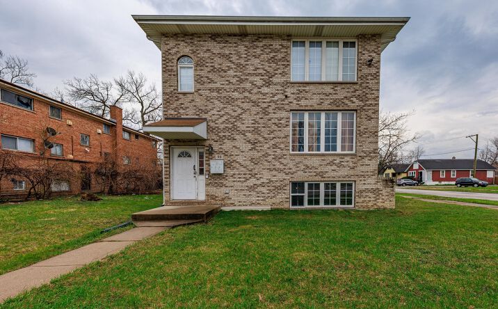 Pictures of Multifamily property located at 98 W 154th Street, Harvey, IL 60426 for sales - image #1