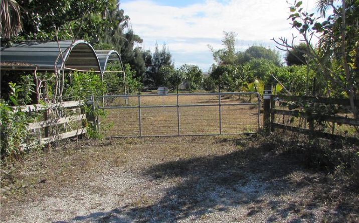 Pictures of Land property located at 8390 Stringfellow Rd, Saint James City, FL 33956 for sales - image #1