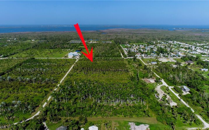 Pictures of Land property located at 14900 Stringfellow Rd, Bokeelia, FL 33922 for sales - image #1