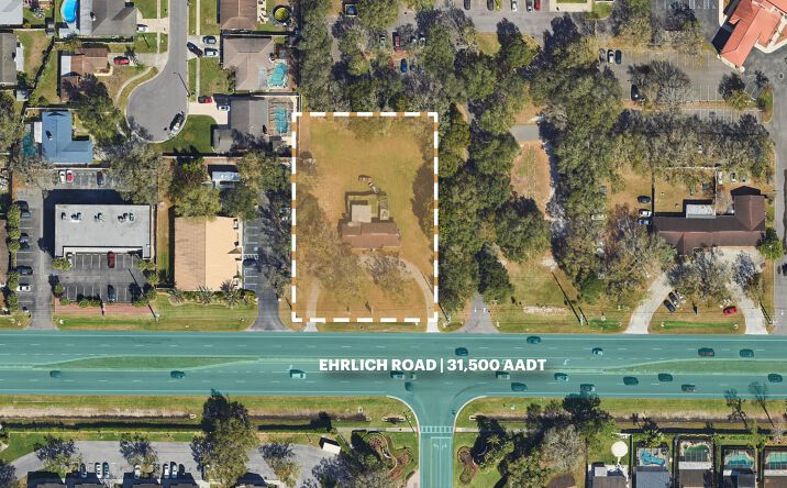 Pictures of Land, Office, Retail property located at 4909 Ehrlich Rd, Tampa, FL 33624 for sales - image #1