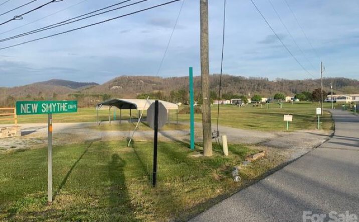 Pictures of Land property located at 7.33 ac com chimney rock highway, Edneyville, NC 28792 for sales - image #1