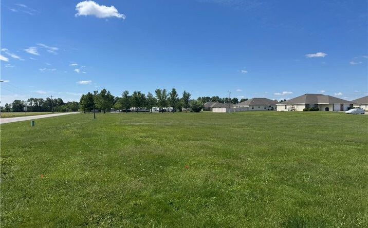 Pictures of Land property located at 504 S West Outer Road, Archie, MO 64725 for sales - image #1