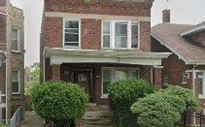 Pictures of Multifamily property located at 11317 S Indiana Avenue, Chicago, IL 60628 for sales - image #1